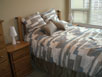 2 queen beds. Premium bedding. Thumb